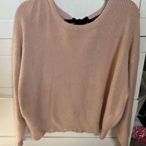 zara light pink sweater with black tie in back